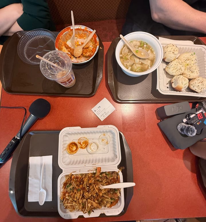 Overhead view of our thre food trays on a table at Aberdeen Centre